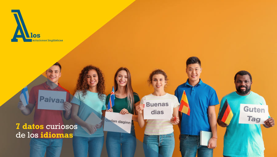 Grupo de personas sosteniendo banderas de distintos países, representando la diversidad lingüística mundial.