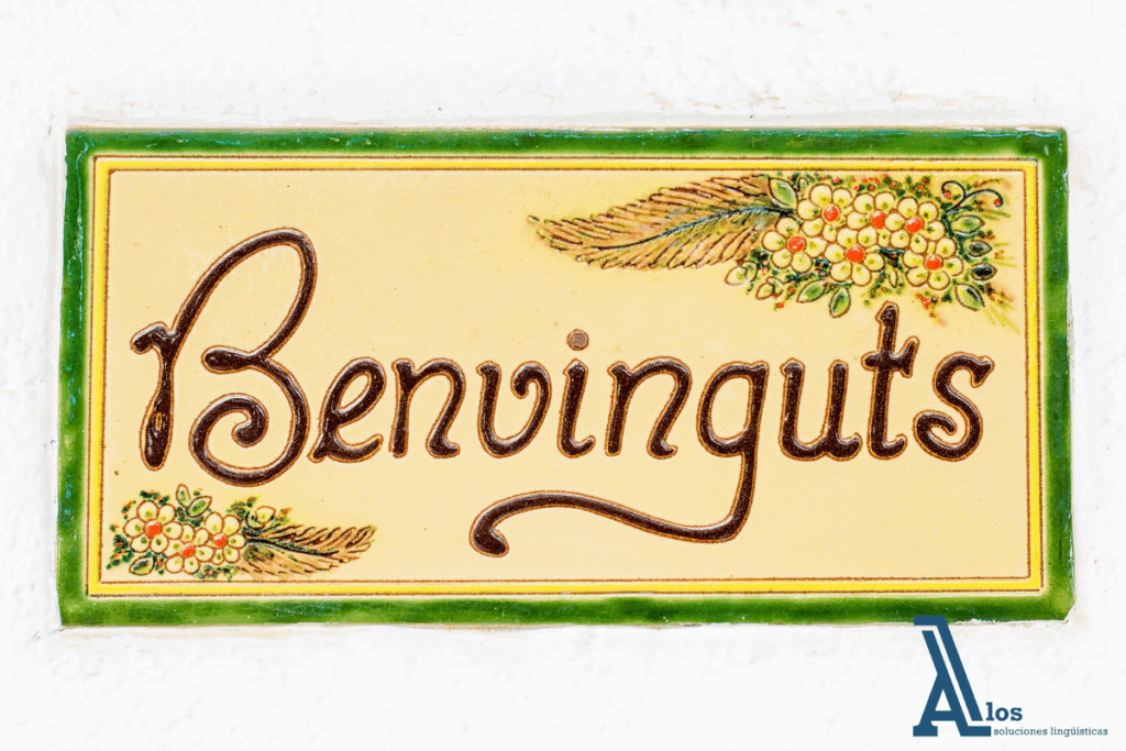 Cartel de bienvenida en catalán con la palabra "Benvinguts"