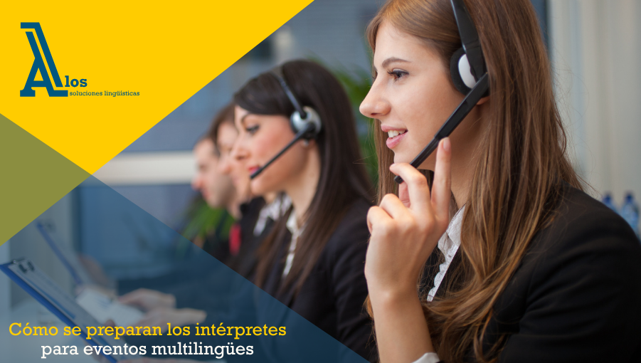 Dos intérpretes trabajando juntas en una cabina de interpretación durante un evento multilingüe.