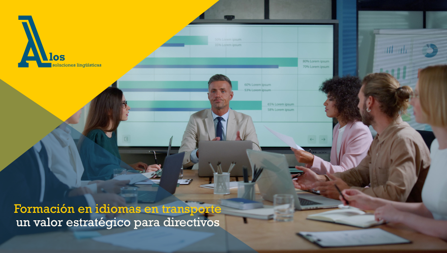 Directivo hablando en una reunión con gráficos, representando la comunicación efectiva en logística gracias al dominio de idiomas